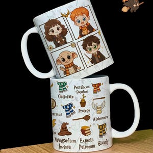 May include: Two white ceramic mugs with Harry Potter designs. One mug features cartoon characters, the other has spells and symbols. The mugs have large handles and are set against a black background and a wooden surface.