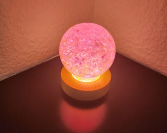 Decorative lamp made of epoxy resin with pink color chips