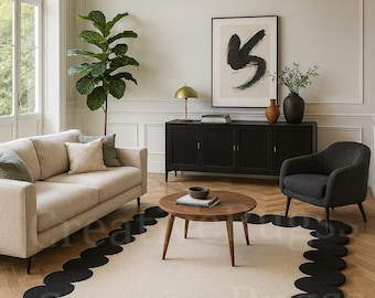 Alfombra moderna con borde festoneado negro, minimalista, hecha a mano, contemporánea, en negro y marfil, con un toque de diseño para sala de estar.