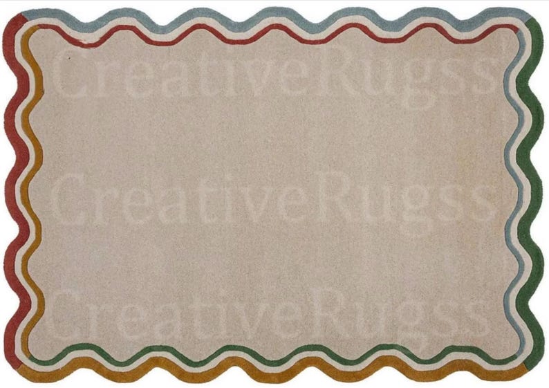 May include: A rectangular rug with a wavy border. The border has a repeating pattern of blue, red, green, and yellow-brown. The rug's central area is a neutral beige colour, and the text "Creative Rugs" is faintly visible.