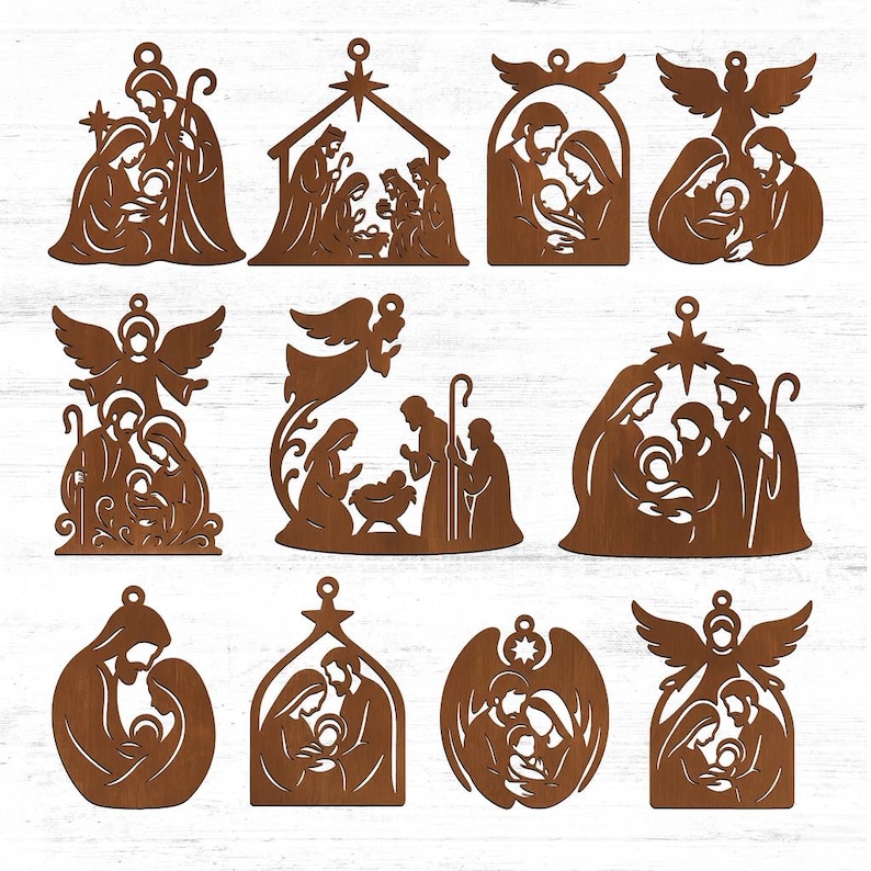 May include: A selection of brown laser-cut Christmas ornaments showing Nativity scenes. Each ornament features silhouettes of Mary, Joseph, baby Jesus, angels, and the stable. The ornaments have a small hole at the top for hanging.