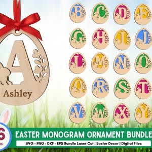 Puede incluir: Adornos de huevo de Pascua de madera con diseños cortados con láser. Un adorno presenta la letra "A" con un conejito y el nombre "Ashley". El conjunto incluye 26 diseños, cada uno con una letra diferente, en varios colores. Se adjunta una cinta roja.