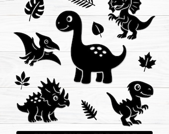 May include: Black dinosaur silhouettes and leaf designs on a white background. The image includes a long-necked dinosaur, a pterodactyl, a triceratops, a T-Rex, and a Dilophosaurus. The text at the bottom reads "SVG - PNG - PDF - JPG".