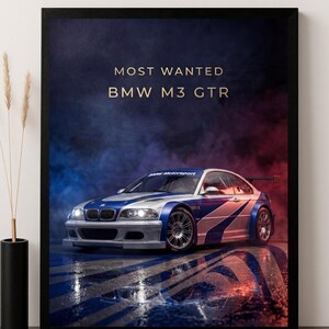 May include: Framed print of a BMW M3 GTR race car with blue and white stripes. The text "MOST WANTED BMW M3 GTR" is in gold against a smoky blue and red backdrop. The car is on a wet, reflective surface.