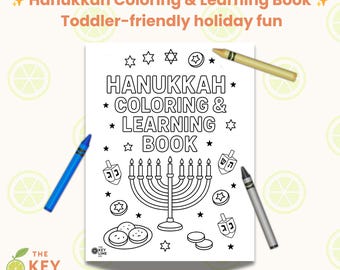 May include: A white coloring and learning book with the text "Hanukkah Coloring & Learning Book" and illustrations of a menorah, dreidels, and stars. A blue, gray, and yellow crayon are placed around the book. The Key Lime Co logo is in the bottom left corner.