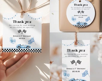 May include: Gift tags with a racing theme. The tags feature a blue race car, checkered flags, and the text "Thank you for racing by and making my birthday so special." The tags are white with a black and white checkered border.