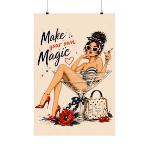 May include: A poster featuring a stylized illustration of a person in a striped swimsuit sitting in a large martini glass, wearing red heels and sunglasses. The text reads Make your own Magic and Be you Always. A polka dot handbag and red flower are included.