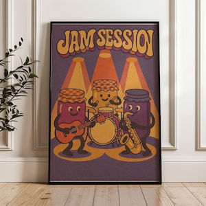 May include: A framed art print featuring a cartoon band of jam jars playing instruments. The text "JAM SESSION" is at the top. The band includes a guitar, drums, and a saxophone, all under orange spotlights against a purple background.
