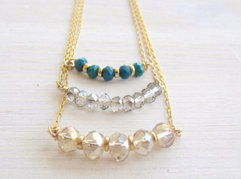 Gold layered necklaces Gold necklaces Gold and crystal necklace Gold beaded necklaces Necklace set Gold necklace set Layered necklaces