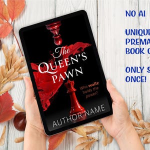 K&ouml;nnte beinhalten: Ein Tablet zeigt ein Buchcover mit dem Titel "The Queen's Pawn" mit einem roten Schachfigurendesign auf schwarzem Hintergrund. Der Text "Who really holds the power?" ist ebenfalls sichtbar. Die W&ouml;rter "NO AI", "UNIQUE PREMADE BOOK COVER" und "ONLY SOLD ONCE!" sind ebenfalls sichtbar.