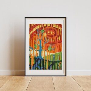 May include: Abstract art print in a black frame. The artwork features a blue tree with green accents against a vibrant orange and red background. The painting has a unique, stylized design with a spiral element.