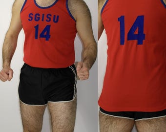 May include: Red athletic vest with blue trim and the text "SGISU 14". The matching black athletic shorts have white trim and stripes. The back of the vest has the number "14" in blue.