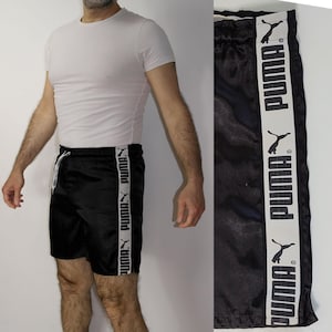 Vintage Puma Satin Shorts Schwarz Weiß Retro 90er 00s Laufhose Glanzshorts mit Logo & Kordeln Größe D 164