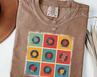 Retro Vinyl Record T-Shirt, vintage distressed LP music lover tee, colorful pop art record player shirt, nostalgic 70s 80s DJ vinyl disc