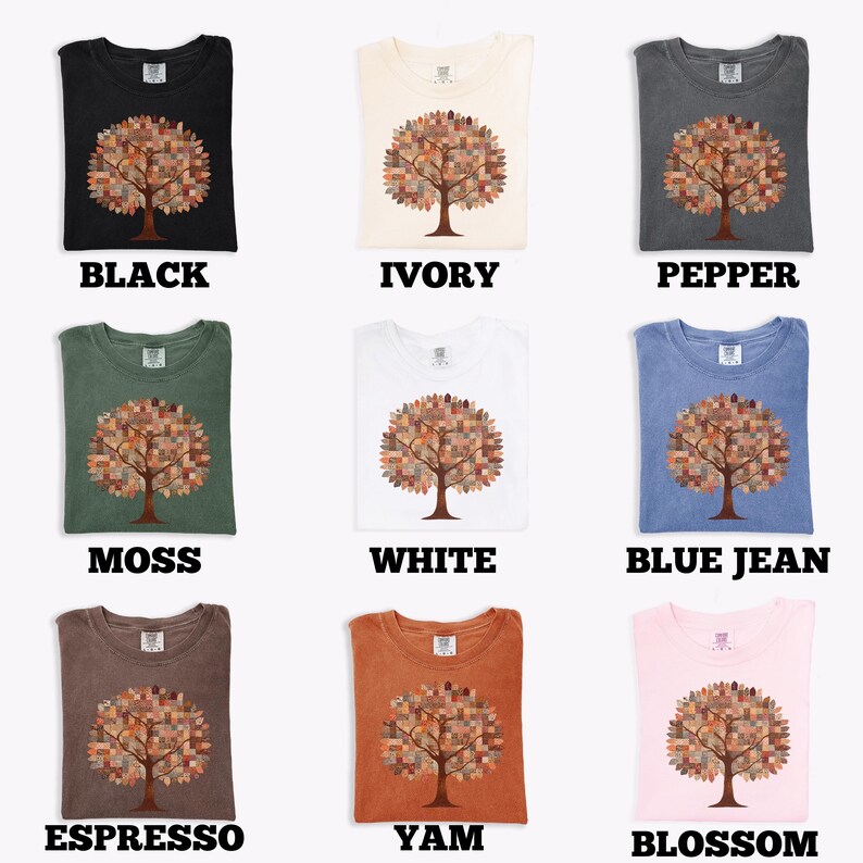 May include: Nine different colored t-shirts, each featuring a tree design with a mosaic-like pattern in the tree's crown. The shirts are in various colors, including black, ivory, pepper, moss, white, blue jean, espresso, yam, and blossom.