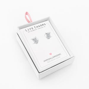 Silver owl stud earrings