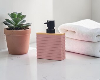 Dispenser di sapone a righe rosa