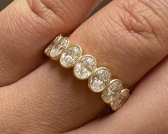 Oval Cut Bezel Setting Moissanite Stacking Ring: 14K Yellow Gold Band