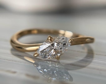 Marquise Cut Modern White Moissanite Solitaire Ring,  14k Yellow gold Waved Band