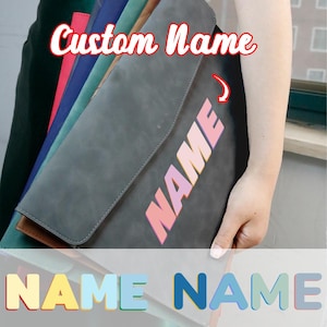 May include: A grey portfolio with the word "NAME" in a gradient pink and orange font. The text "Custom Name" is in a red script font. Other portfolios in green, blue, and red are visible.