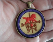 Vintage Girl Scout Horse Weathervane Badge in Antique Gold Pendant Setting 24 Inch Necklace Wearable Textile Artwork