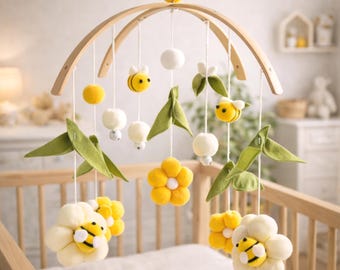 Giostrina per culla con api e fiori, ispirata al metodo Montessori.