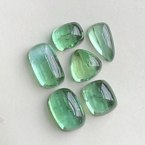 13 CT’s Green tourmaline cabochons lot