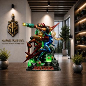 Puede incluir: Una escultura detallada con personajes de la serie de videojuegos Metroid. La escultura representa a Samus Aran con un traje azul y una figura robótica con armadura naranja y verde. La base de la escultura tiene la palabra "METROID" en rojo.