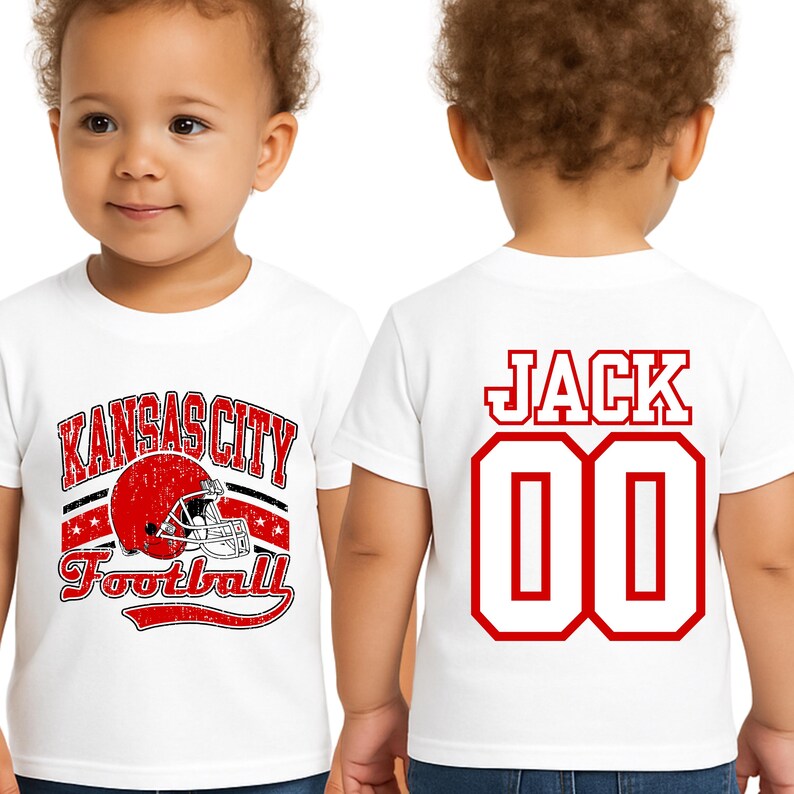 A young child wearing a white t-shirt with a graphic design and text, including the name 'Jack' and the number '00'.