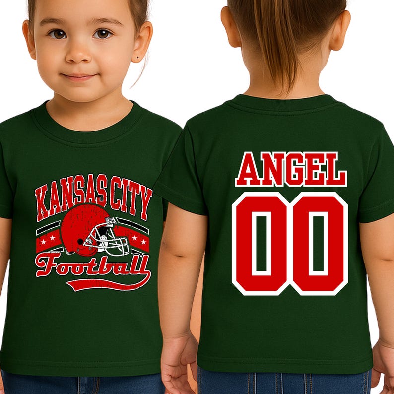 A young girl wearing a green t-shirt with a football helmet and the text "KANSAS CITY FOOTBALL" printed on it.