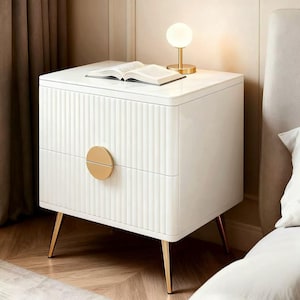 May include: A set of three ceramic mugs with a speckled, matte finish. The mugs are in shades of cream, light grey, and dark grey. Each mug has a simple, minimalist design and a rounded handle. The mugs are stacked on top of each other.