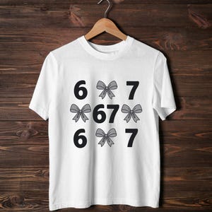 funny shirt,67 hand Png Svg,football,Sports Gift shirt,viral meme shirt,2025 trend,six seven joke67 meme, 67 sweater, Cute 67 png, 67 meme design, Six Seven Png, Six Seven Shirt, Viral Tik Tok Png,Funny Saying Shirt, funny 6 7 design png
Six Seven 6 7 Meme Funny Hands PNG Bundle, Viral Internet Meme Humor, Funny Generation Z, 67 Trend, Funny Social Media,Sports Gift shirt
Funny PNG, Six Seven Png, Six Seven Shirt, 6 7 Shirt, Viral Phrase Meme T-Shirt, Viral TikTok Png, Funny Saying Shirt