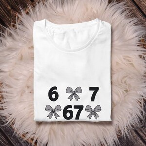 funny shirt,67 hand Png Svg,football,Sports Gift shirt,viral meme shirt,2025 trend,six seven joke67 meme, 67 sweater, Cute 67 png, 67 meme design, Six Seven Png, Six Seven Shirt, Viral Tik Tok Png,Funny Saying Shirt, funny 6 7 design png
Six Seven 6 7 Meme Funny Hands PNG Bundle, Viral Internet Meme Humor, Funny Generation Z, 67 Trend, Funny Social Media,Sports Gift shirt
Funny PNG, Six Seven Png, Six Seven Shirt, 6 7 Shirt, Viral Phrase Meme T-Shirt, Viral TikTok Png, Funny Saying Shirt
