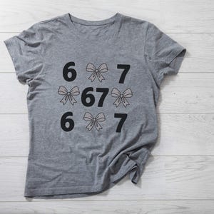 funny shirt,67 hand Png Svg,football,Sports Gift shirt,viral meme shirt,2025 trend,six seven joke67 meme, 67 sweater, Cute 67 png, 67 meme design, Six Seven Png, Six Seven Shirt, Viral Tik Tok Png,Funny Saying Shirt, funny 6 7 design png
Six Seven 6 7 Meme Funny Hands PNG Bundle, Viral Internet Meme Humor, Funny Generation Z, 67 Trend, Funny Social Media,Sports Gift shirt
Funny PNG, Six Seven Png, Six Seven Shirt, 6 7 Shirt, Viral Phrase Meme T-Shirt, Viral TikTok Png, Funny Saying Shirt