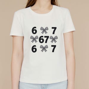 funny shirt,67 hand Png Svg,football,Sports Gift shirt,viral meme shirt,2025 trend,six seven joke67 meme, 67 sweater, Cute 67 png, 67 meme design, Six Seven Png, Six Seven Shirt, Viral Tik Tok Png,Funny Saying Shirt, funny 6 7 design png
Six Seven 6 7 Meme Funny Hands PNG Bundle, Viral Internet Meme Humor, Funny Generation Z, 67 Trend, Funny Social Media,Sports Gift shirt
Funny PNG, Six Seven Png, Six Seven Shirt, 6 7 Shirt, Viral Phrase Meme T-Shirt, Viral TikTok Png, Funny Saying Shirt