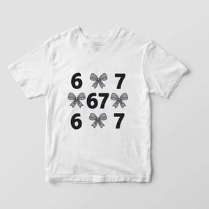 funny shirt,67 hand Png Svg,football,Sports Gift shirt,viral meme shirt,2025 trend,six seven joke67 meme, 67 sweater, Cute 67 png, 67 meme design, Six Seven Png, Six Seven Shirt, Viral Tik Tok Png,Funny Saying Shirt, funny 6 7 design png
Six Seven 6 7 Meme Funny Hands PNG Bundle, Viral Internet Meme Humor, Funny Generation Z, 67 Trend, Funny Social Media,Sports Gift shirt
Funny PNG, Six Seven Png, Six Seven Shirt, 6 7 Shirt, Viral Phrase Meme T-Shirt, Viral TikTok Png, Funny Saying Shirt