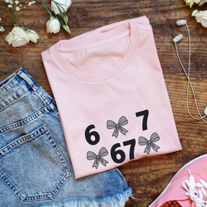 funny shirt,67 hand Png Svg,football,Sports Gift shirt,viral meme shirt,2025 trend,six seven joke67 meme, 67 sweater, Cute 67 png, 67 meme design, Six Seven Png, Six Seven Shirt, Viral Tik Tok Png,Funny Saying Shirt, funny 6 7 design png
Six Seven 6 7 Meme Funny Hands PNG Bundle, Viral Internet Meme Humor, Funny Generation Z, 67 Trend, Funny Social Media,Sports Gift shirt
Funny PNG, Six Seven Png, Six Seven Shirt, 6 7 Shirt, Viral Phrase Meme T-Shirt, Viral TikTok Png, Funny Saying Shirt