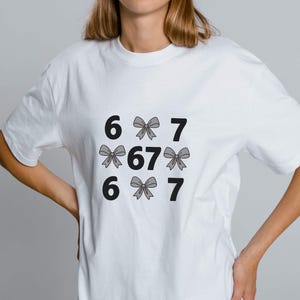 funny shirt,67 hand Png Svg,football,Sports Gift shirt,viral meme shirt,2025 trend,six seven joke67 meme, 67 sweater, Cute 67 png, 67 meme design, Six Seven Png, Six Seven Shirt, Viral Tik Tok Png,Funny Saying Shirt, funny 6 7 design png
Six Seven 6 7 Meme Funny Hands PNG Bundle, Viral Internet Meme Humor, Funny Generation Z, 67 Trend, Funny Social Media,Sports Gift shirt
Funny PNG, Six Seven Png, Six Seven Shirt, 6 7 Shirt, Viral Phrase Meme T-Shirt, Viral TikTok Png, Funny Saying Shirt