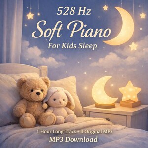 May include: A brown teddy bear and a white plush rabbit sit on a bed with a blue wall featuring a crescent moon and stars. Text reads: 528 Hz Soft Piano For Kids Sleep, 1 Hour Long Track + 3 Original MP3, MP3 Download. Two glowing lamps shaped like a moon and star sit nearby.