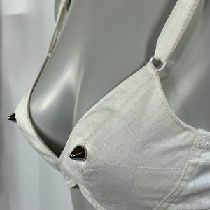 Pointy custom 1950s 1940s 40s 50s vintage retro pin up breasts nipples studs form wireless wirefree white linen pad cone bullet lingerie bra