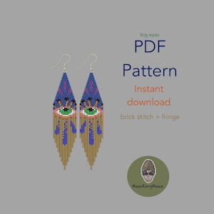 May include: A pair of beaded earrings with a unique eye design. The earrings feature a blue and pink top section with a green eye, and a gold fringe. The text on the image says "big eyes PDF Pattern Instant download brick stitch + fringe".
