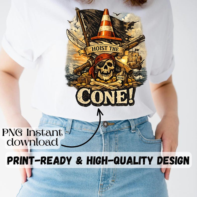 May include: White t-shirt featuring a pirate-themed graphic with a skull wearing an eye patch, a traffic cone, and the text "HOIST THE CONE!". The design includes a pirate ship, weapons, and the word "HUM".