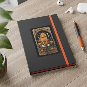 Spooky Orange Cat Journal featuring Sword, Oranges - Ruled Line Banded Notebook for Halloween