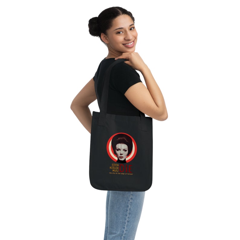 May include: Black tote bag with a red and white circle design featuring a woman's face and the text "Edith Keeler Must Die" and the words "She stood on the stage of forever".