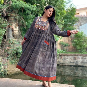 indian inspired midi dress Indian Inspired Dress With Kutch Hand Embroidered Yoke. This Midi Dress is  From Ajrakh Block Printed Cotton, With Loads of Designer Details