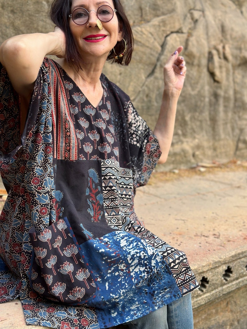 Cotton kaftan tunic with an asymmetrical patch design of Ajrakh. It has a V neckline and pockets. Loose fitting style with a wide sleeve image 3