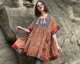 Short Kaftan features rare Indian embroidery neckline. Cotton floral in tan with colorful patchwork highlight shades in the colorful bodice