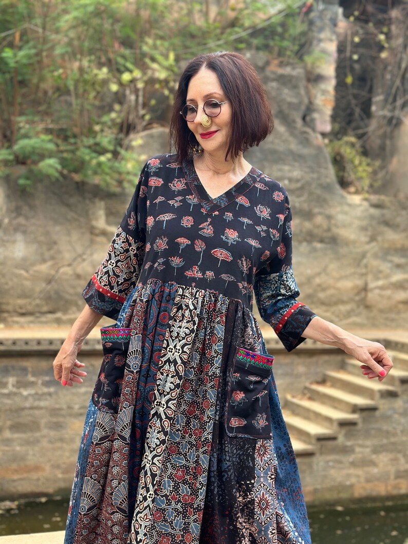 A wearable art dress of hand dyed cottons. An Individual design, highlighted with colorful Indian hand embroidery decorating the pockets image 6