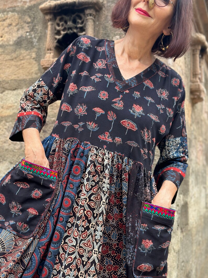 A wearable art dress of hand dyed cottons. An Individual design, highlighted with colorful Indian hand embroidery decorating the pockets image 7