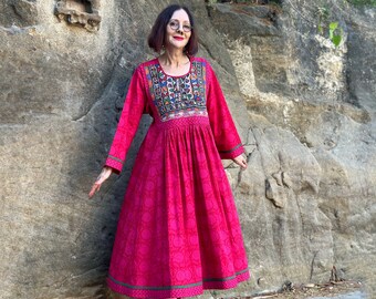 Hot pink dress with bodice of Indian embroidery. Stunning, colorful needlework, give this vibrant dress special occasion style